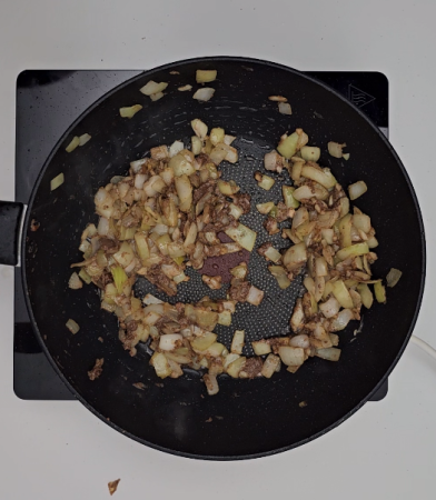 Sautéing the onion, garlic, and shrimp paste