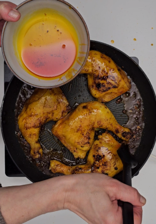 Chicken Inasal Preparation Step 4 - . Grilling the chicken, frequently basting it with the annatto oil