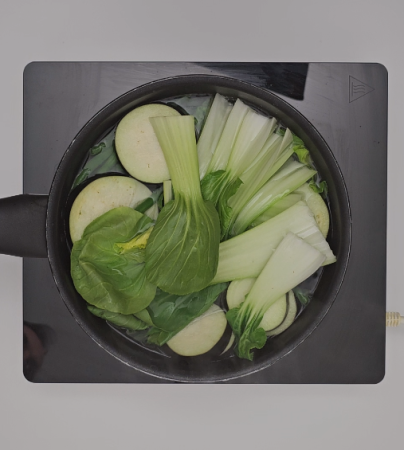 Filipino Kare Kare preparation step 4 - blanching the eggplant, string beans, and bok choy